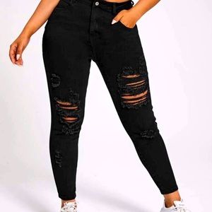 Ripped Slant pocket jeans , color black . NEVER WORN TOO SMALL .